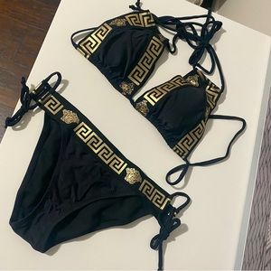 New / unworn two piece black and gold bikini